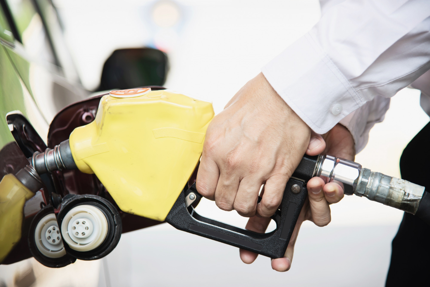 Man Pumping Gas